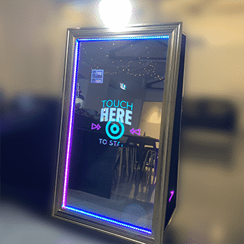 Magic Mirror photo booth in action during an event